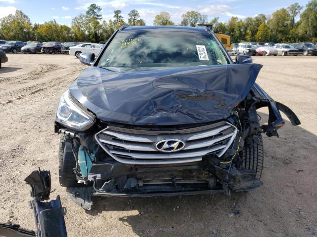 Photo 5 from auction – 2018 HYUNDAI SANTA FE S with VIN 5NMZU3LB0JH097275