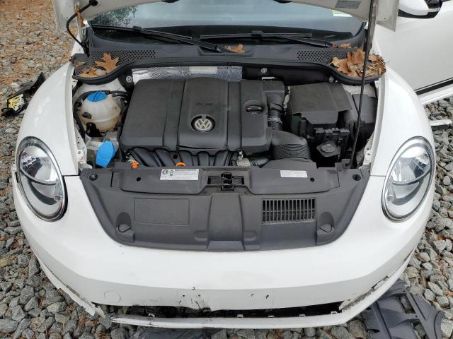 Photo 11 from auction – 2013 VOLKSWAGEN BEETLE with VIN 3VWJX7AT7DM670243