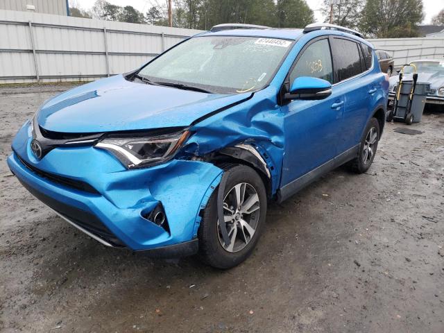 TOYOTA RAV4 ADVEN 2018 with VIN 2T3RFREV1JW814444 - Photo from auction