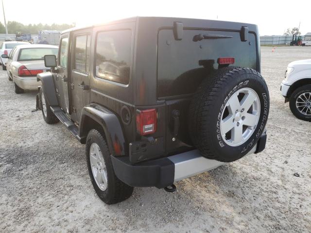 Photo 2 from auction – 2011 JEEP WRANGLER U with VIN 1J4BA5H18BL512245