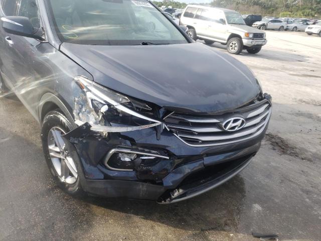 Photo 12 from auction – 2018 HYUNDAI SANTA FE with VIN 5NMZU3LB9HH051616