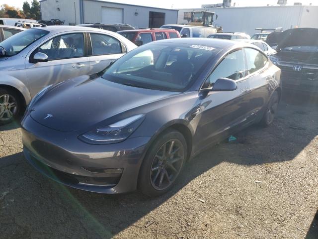 TESLA MODEL 3 2022 with VIN 5YJ3E1EB0NF211464 - Photo from auction