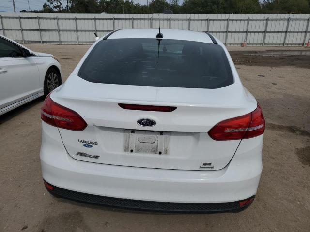 Photo 6 from auction – 2018 FORD FOCUS SE with VIN 1FADP3FE4JL319649