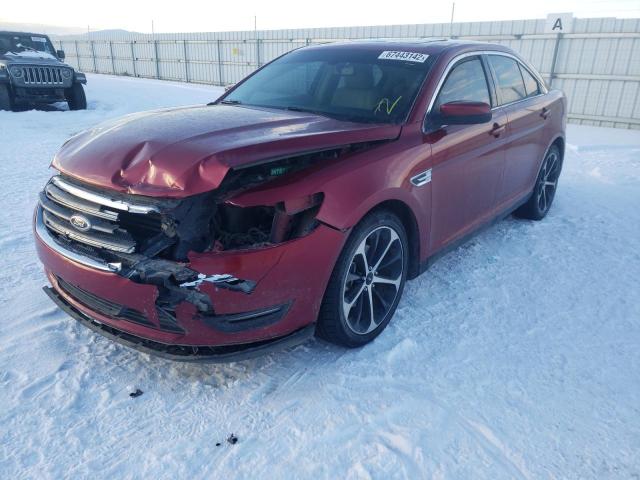 FORD TAURUS SEL 2015 with VIN 1FAHP2H81FG139550 - Photo from auction