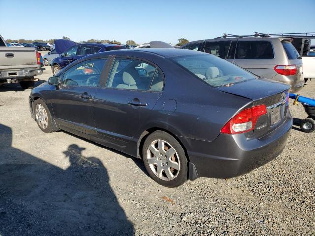Photo 2 from auction – 2010 HONDA CIVIC LX with VIN 19XFA1F50AE067688