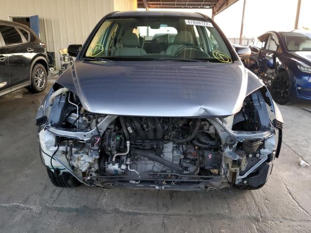 Photo 5 from auction – 2011 HONDA CR-V LX with VIN 5J6RE3H33BL030176