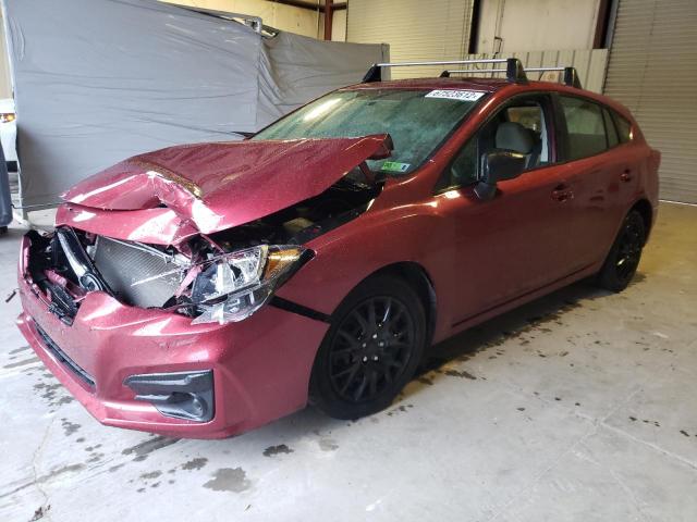 SUBARU IMPREZA 2018 with VIN 4S3GTAA66J1712510 - Photo from auction