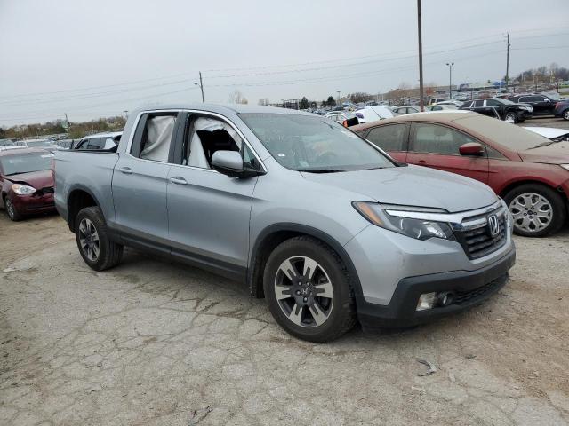 Photo 4 from auction – 2018 HONDA RIDGELINE with VIN 5FPYK3F54JB017055