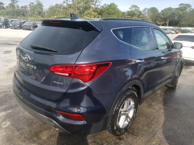 Photo 3 from auction – 2018 HYUNDAI SANTA FE with VIN 5NMZU3LB9HH051616
