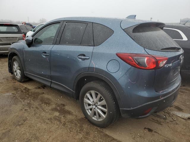 Photo 2 from auction – 2015 MAZDA CX-5 TOURI with VIN JM3KE2CY0F0520383