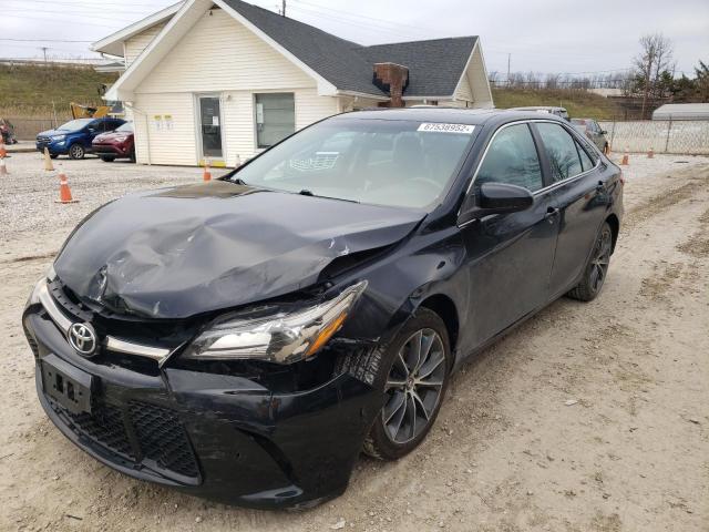 TOYOTA CAMRY LE 2015 with VIN 4T1BF1FK7FU977610 - Photo from auction