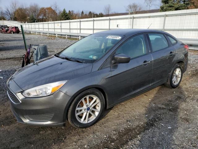 FORD FOCUS 2018 with VIN 1FADP3FE1JL215006 - Photo from auction