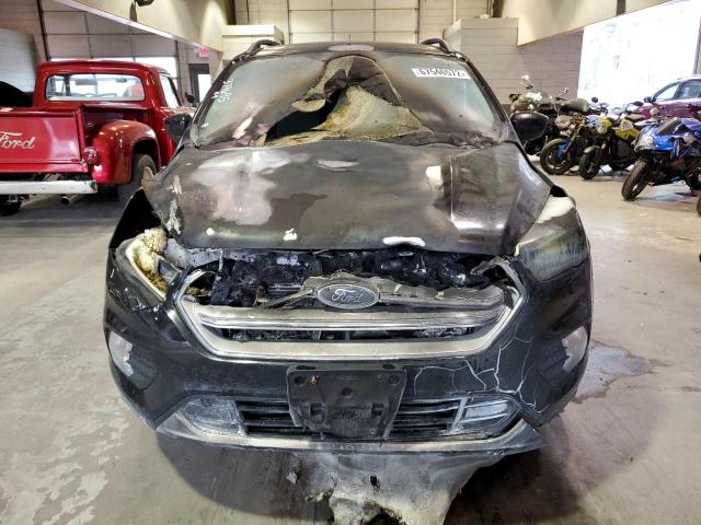 Photo 5 from auction – 2018 FORD ESCAPE SE with VIN 1FMCU9GD5JUA79993