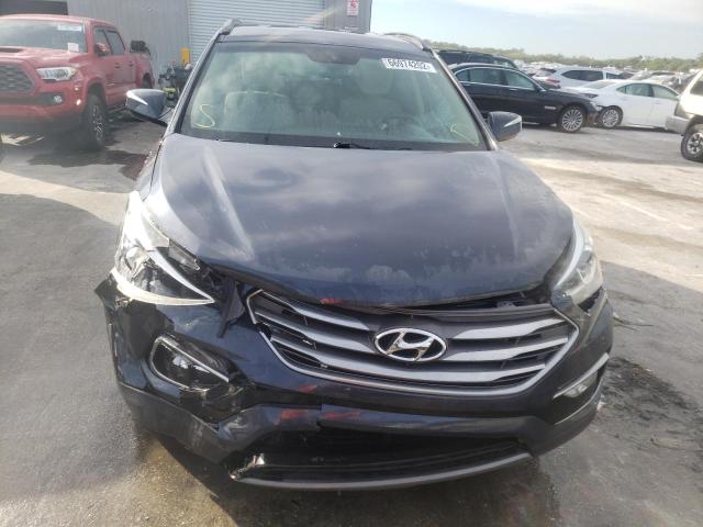 Photo 5 from auction – 2018 HYUNDAI SANTA FE with VIN 5NMZU3LB9HH051616