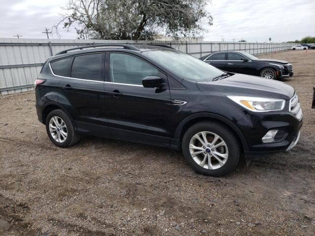 Photo 4 from auction – 2018 FORD ESCAPE SE with VIN 1FMCU0GD4JUC03229