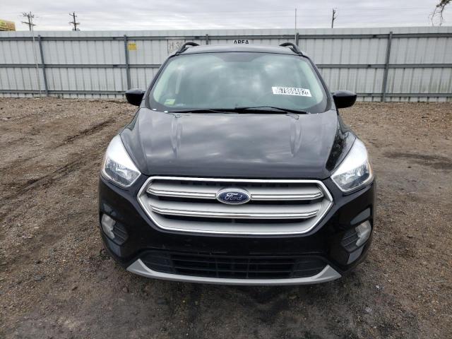 Photo 5 from auction – 2018 FORD ESCAPE SE with VIN 1FMCU0GD4JUC03229