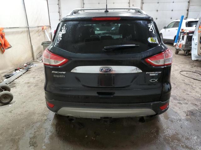 Foto 6 de la subasta – 2015 FORD ESCAPE TIT con VIN 1FMCU9J90FUB12197