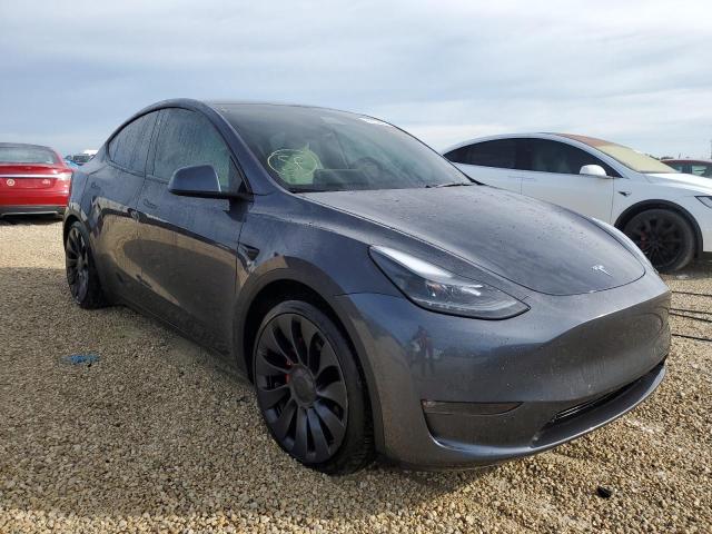 TESLA MODEL Y 2022 with VIN 7SAYGDEF1NF398544 - Photo from auction