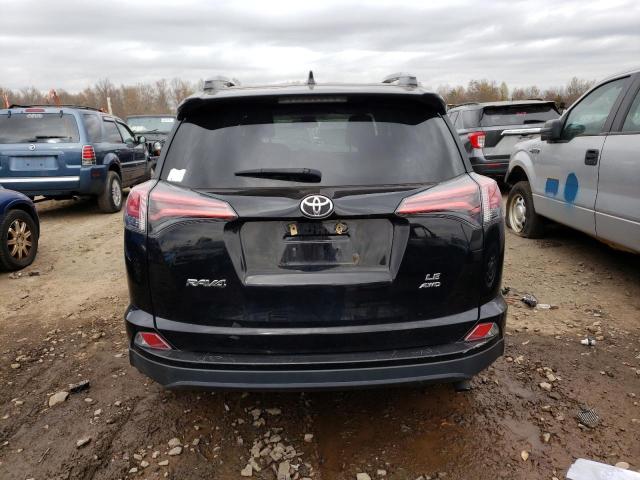 Photo 6 from auction – 2018 TOYOTA RAV4 LE with VIN 2T3BFREV1JW728259