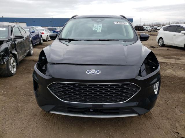 Photo 5 from auction – 2021 FORD ESCAPE SEL with VIN 1FMCU9H93MUB19096