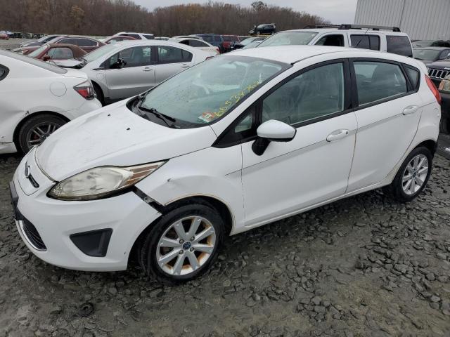 FORD FIESTA SE 2011 with VIN 3FADP4EJ3BM153239 - Photo from auction
