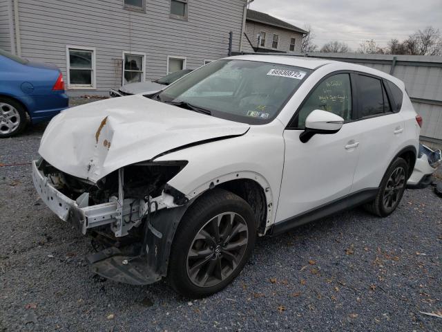 MAZDA CX-5 GT 2016 with VIN JM3KE4DY2G0765522 - Photo from auction