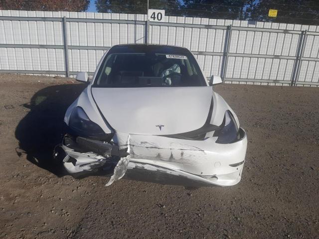 Photo 5 from auction – 2022 TESLA MODEL 3 with VIN 5YJ3E1EB5NF138706