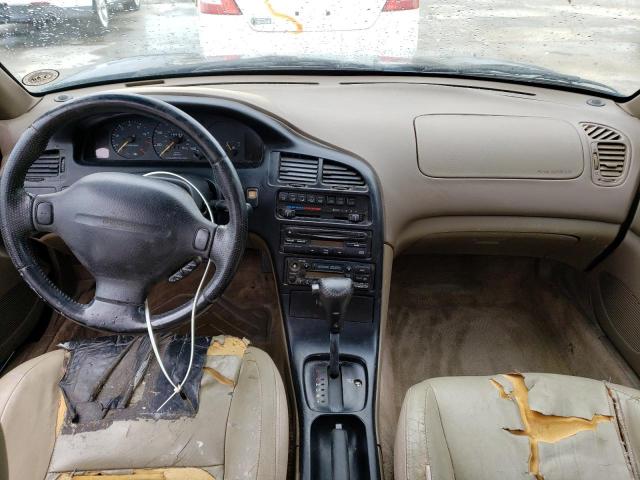 Photo 8 from auction – 1997 MAZDA MX-6 LS with VIN 1YVGE31D0V5668632
