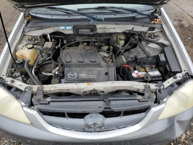 Photo 12 from auction – 2002 MAZDA TRIBUTE LX with VIN 4F2YU08182KM54752