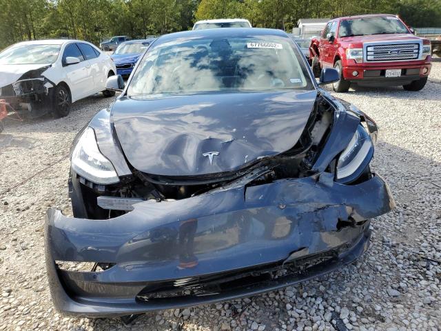 Photo 5 from auction – 2021 TESLA MODEL 3 with VIN 5YJ3E1EA8MF851069