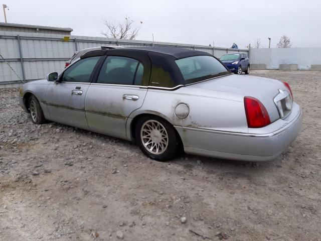 Photo 2 from auction – 2002 LINCOLN TOWN CAR S with VIN 1LNHM82W8YY891011