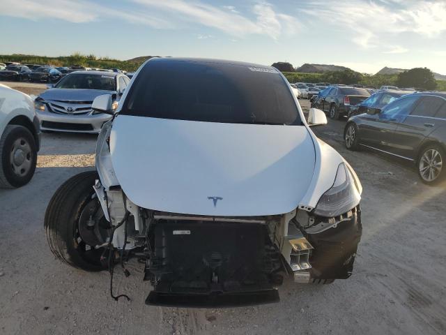 Photo 5 from auction – 2022 TESLA MODEL Y with VIN 7SAYGDEF0NF534243