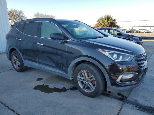 Photo 4 from auction – 2017 HYUNDAI SANTA FE S with VIN 5NMZU3LBXHH010167
