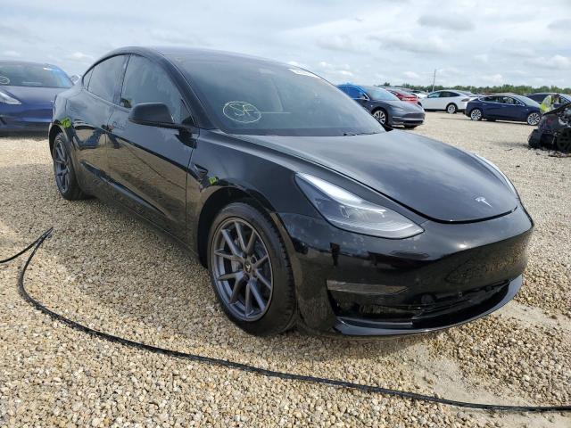 TESLA MODEL 3 2021 with VIN 5YJ3E1EB1MF984281 - Photo from auction