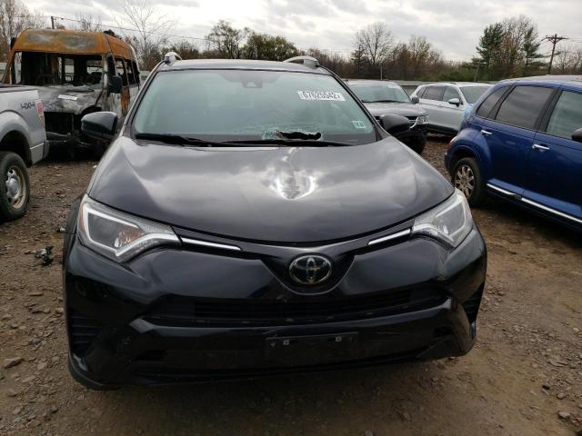 Photo 5 from auction – 2018 TOYOTA RAV4 LE with VIN 2T3BFREV1JW728259