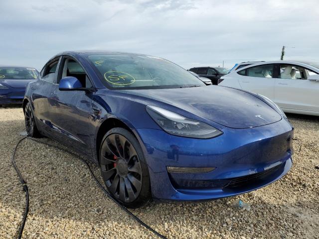 TESLA MODEL 3 2022 with VIN 5YJ3E1EC9NF128236 - Photo from auction