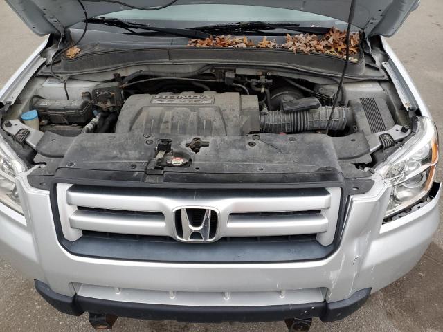 Photo 12 from auction – 2006 HONDA PILOT EX with VIN 2HKYF18586H507974