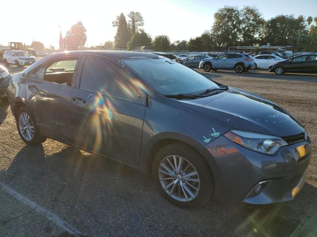 Photo 4 from auction – 2014 TOYOTA COROLLA L with VIN 5YFBURHE8EP008457