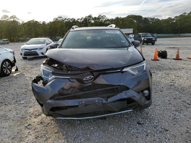 Photo 5 from auction – 2016 TOYOTA RAV4 XLE with VIN JTMWFREV7GJ090429