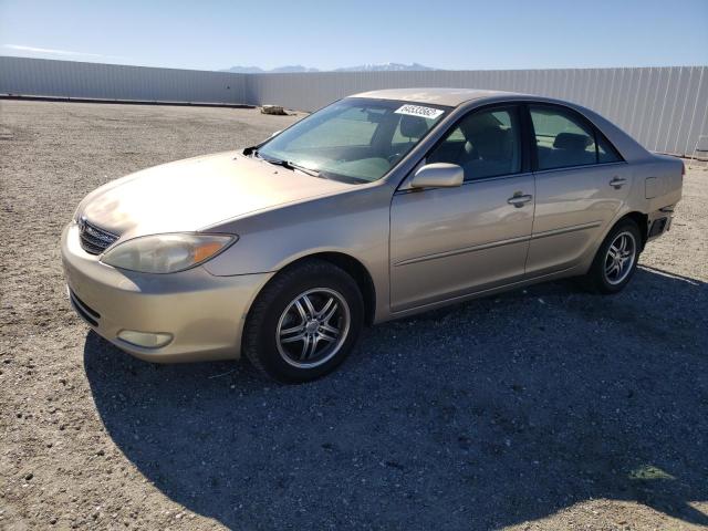 TOYOTA CAMRY LE 2002 with VIN JTDBE32KX20003999 - Photo from auction