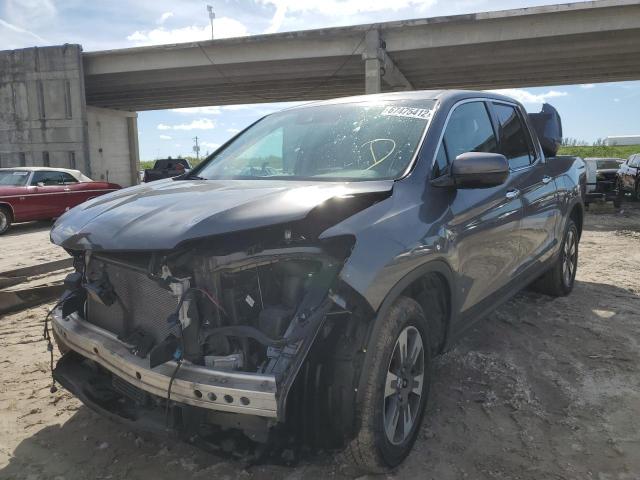 HONDA RIDGELINE 2018 with VIN 5FPYK3F71JB002398 - Photo from auction