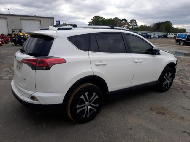 Photo 3 from auction – 2018 TOYOTA RAV4 LE with VIN JTMZFREV7JJ724908