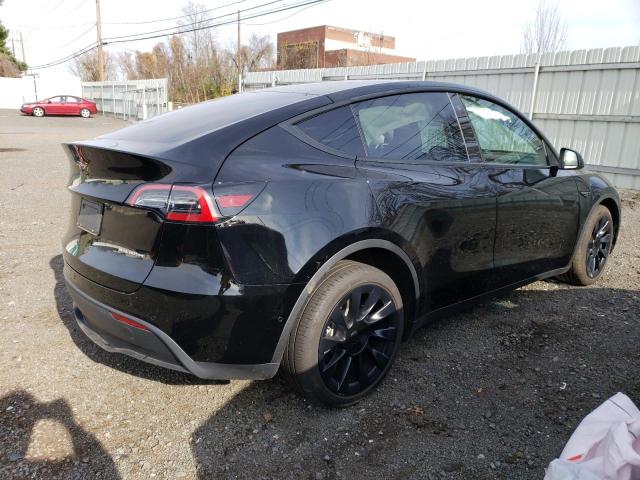 Photo 3 from auction – 2022 TESLA MODEL Y with VIN 7SAYGAEE9NF387670