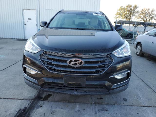 Photo 5 from auction – 2017 HYUNDAI SANTA FE S with VIN 5NMZU3LBXHH010167