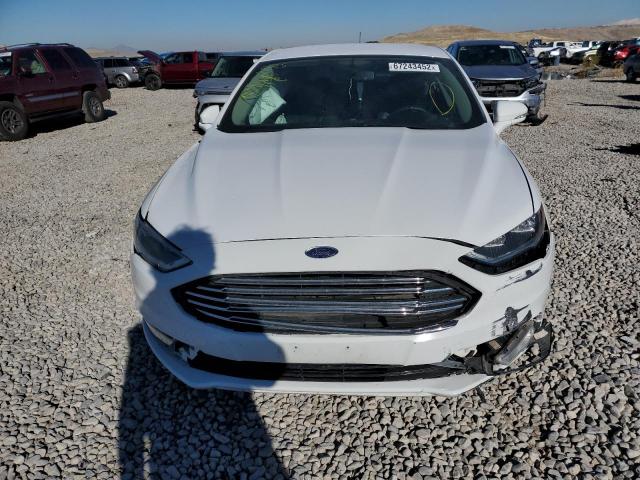 Photo 5 from auction – 2018 FORD FUSION TIT with VIN 3FA6P0RU4JR205968