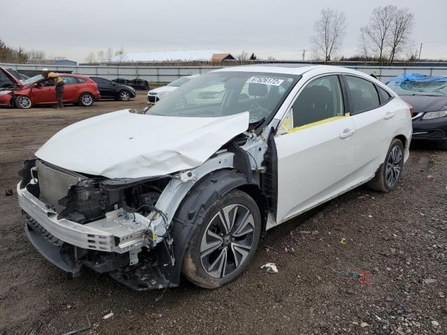 HONDA CIVIC EX 2018 with VIN JHMFC1F31JX032620 - Photo from auction