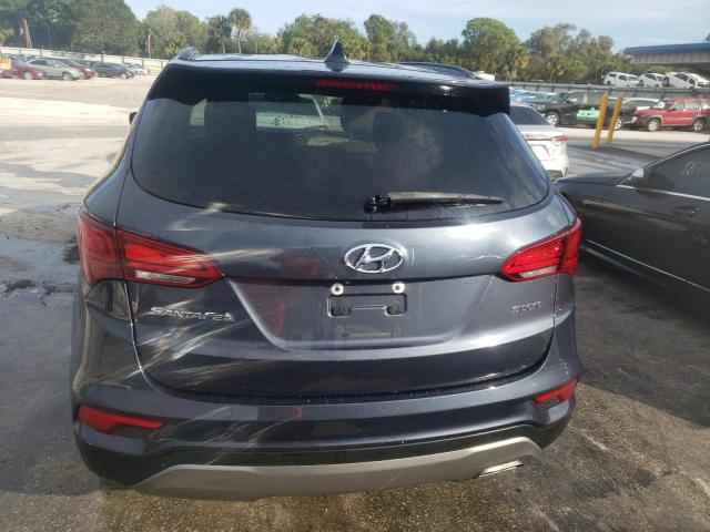 Photo 6 from auction – 2018 HYUNDAI SANTA FE with VIN 5NMZU3LB9HH051616
