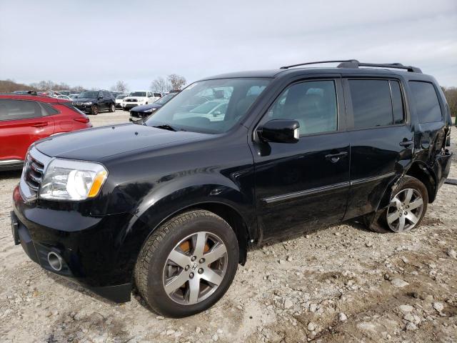 HONDA PILOT TOUR 2014 with VIN 5FNYF4H96EB031239 - Photo from auction