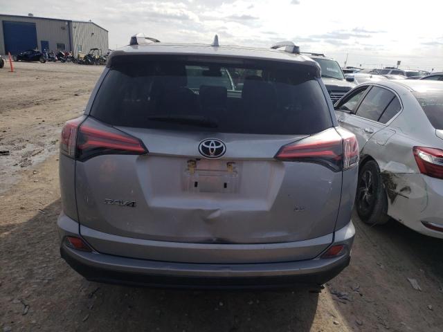 Photo 6 from auction – 2018 TOYOTA RAV4 LE with VIN 2T3ZFREV3JW463035