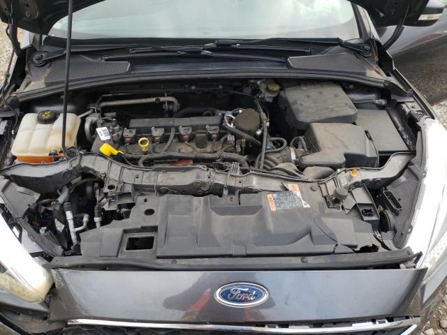 Photo 11 from auction – 2015 FORD FOCUS SE with VIN 1FADP3F27FL214908